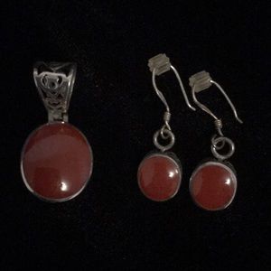 Pendant necklace and matching earrings.